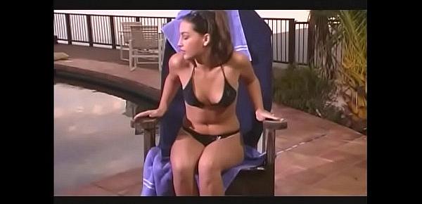  Brunette nympho with amazing body deepthroats a fat white cock by pool and fucks